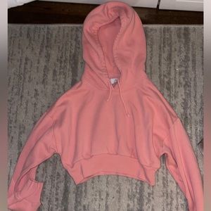 Aritzia TNA pink cropped hoodie